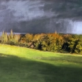 Late afternoon sun with an approaching storm